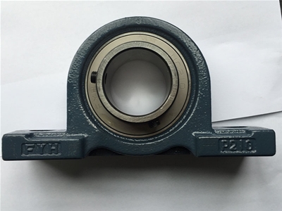 Spherical bearing with seat